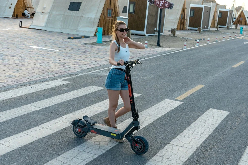 Model posing with KUKIRIN G2 Ultra electric scooter outdoors